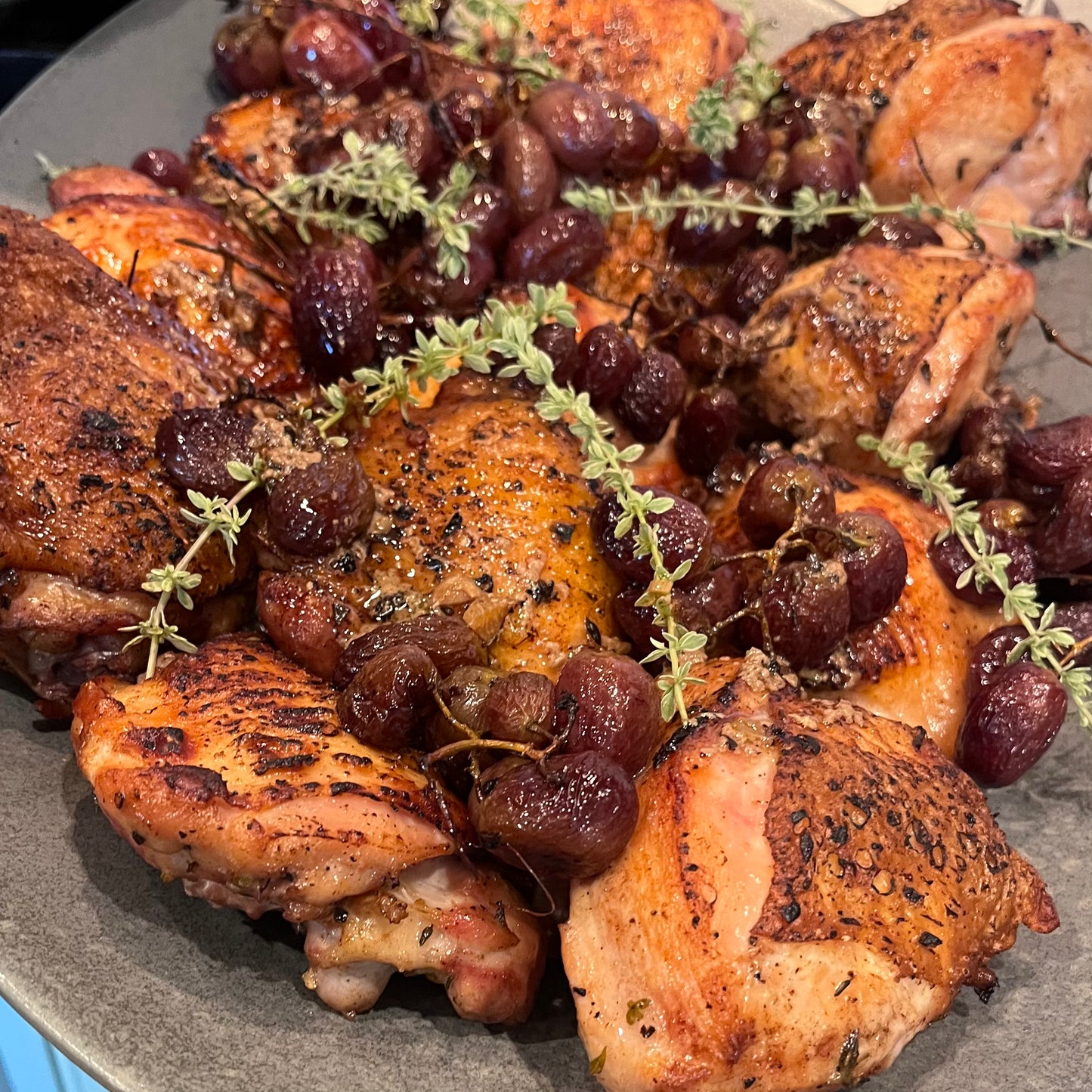 Roasted chicken: Roasted chicken with caramelized grapes and fresh thyme — a whole-animal cooking class recipe from the Waste Not, Want Not series in Santa Barbara