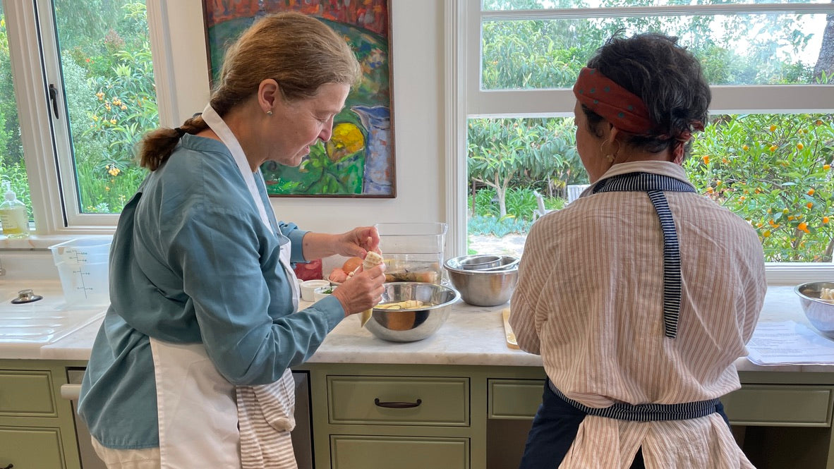 laurence and Sonoko Sakai cooking together