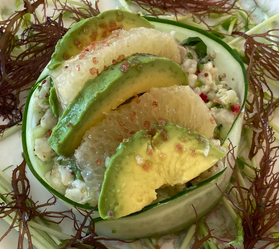 rock crab salad in cucumber ring with avocado, ogo seaweed, Hawaiian red salt